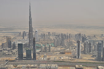 Aerial View of Dubai Skyline with Burj Khalifa and Desert
