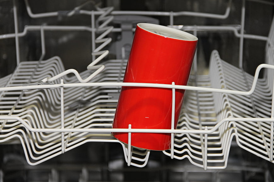 Red Ceramic Cup In Dishwasher Rack