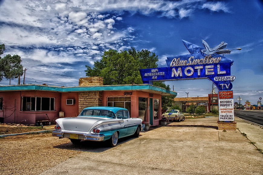 Blue Swallow Motel in Tucumcari, New Mexico with vintage classic car