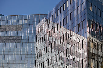 Modern Glass Building Facade with Reflections
