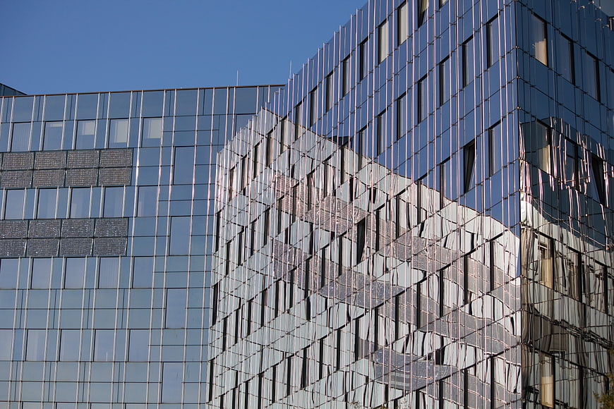 Modern Glass Building Facade with Reflections