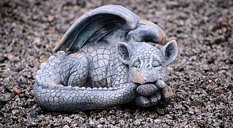Sleeping Stone Dragon Garden Statue On Gravel