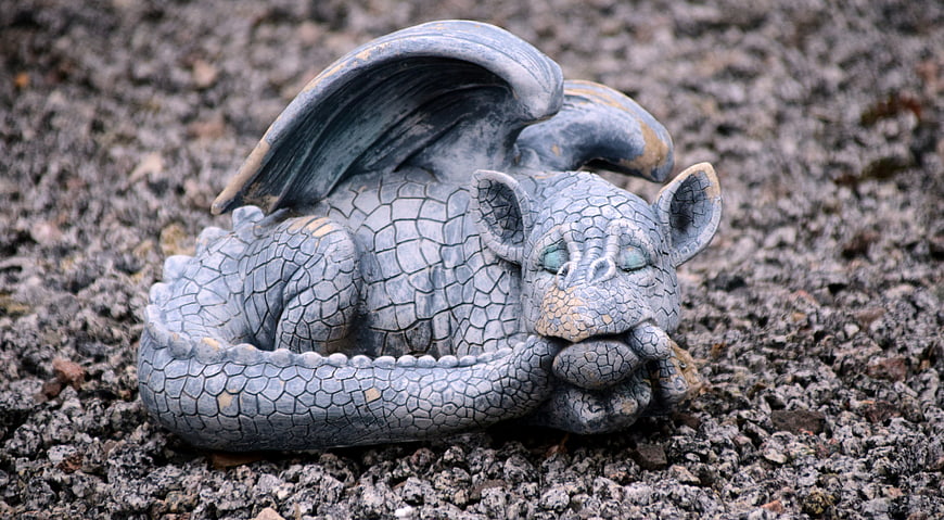 Sleeping Stone Dragon Garden Statue On Gravel