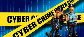 Cyber Crime Concept with Police Figurines and Binary Code