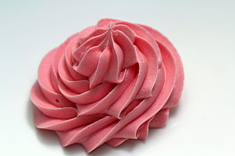 Pink Buttercream Frosting Swirl Isolated On White Background