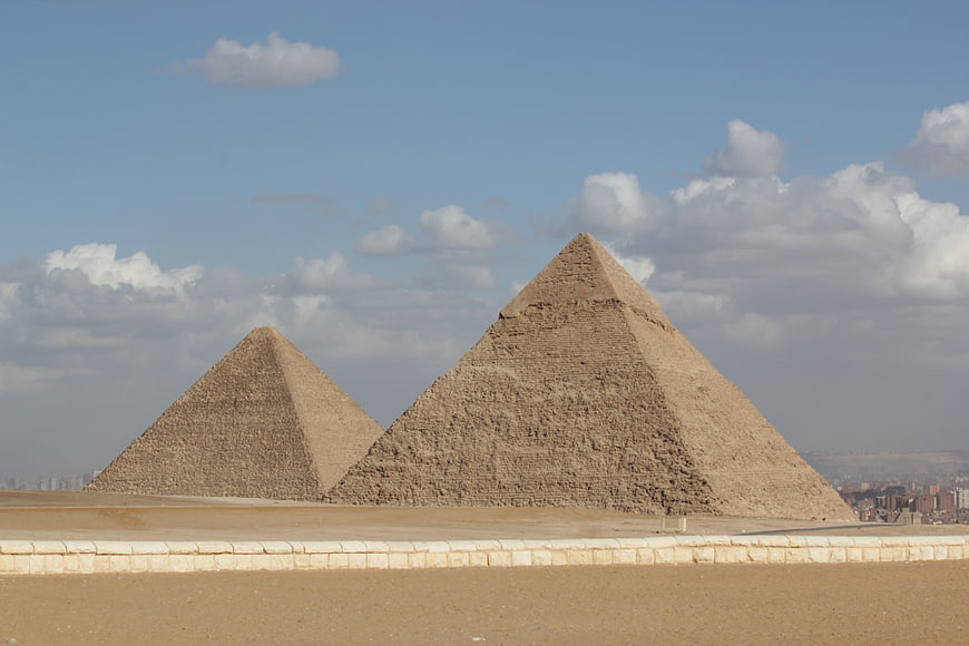 Giza Pyramids in Egypt with Blue Sky and Clouds