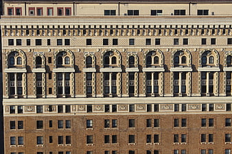 Detailed facade of historic Chicago architecture with ornate windows