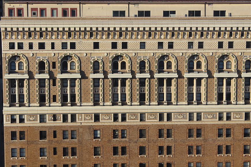 Detailed facade of historic Chicago architecture with ornate windows