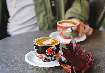 Autumn Coffee with Red Maple Leaf and Latte Art