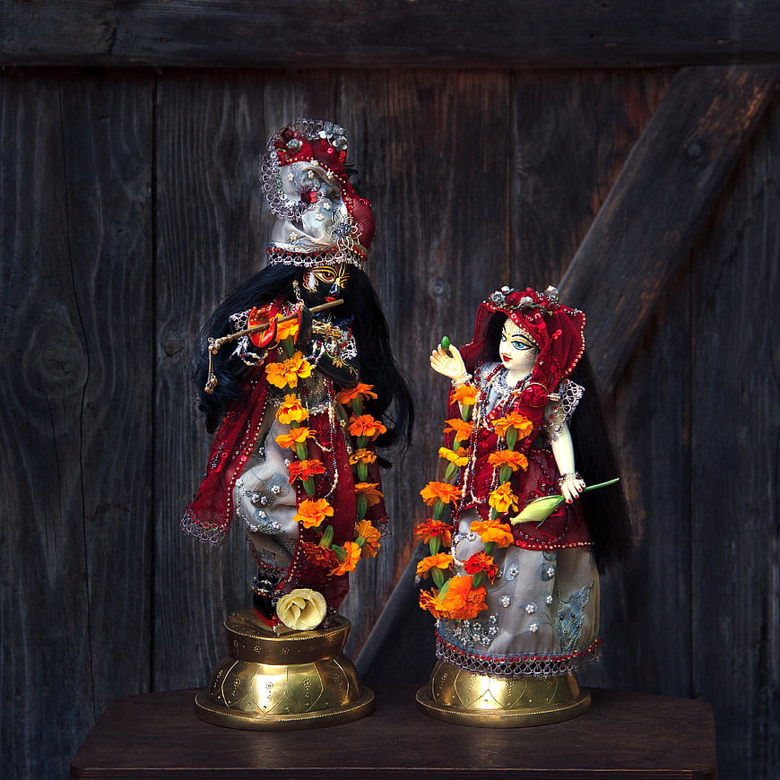 Traditional Radha Krishna Murti Statues with Marigold Garland