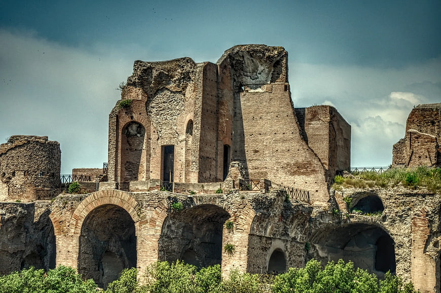 Ancient Roman Ruins with Arches and Blue Sky