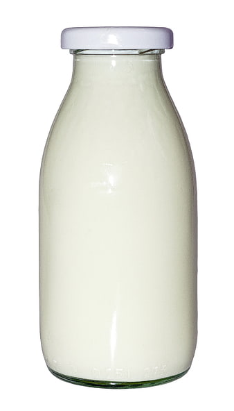 Glass Bottle of Fresh Milk Isolated on White Background