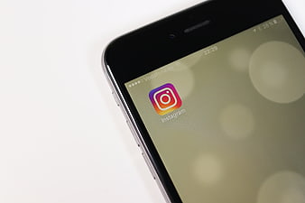 Close-up of Instagram app icon on a smartphone screen