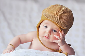 Adorable Baby Boy Wearing Corduroy Aviator Hat