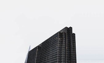 Modern Skyscraper Architecture Against Overcast Sky