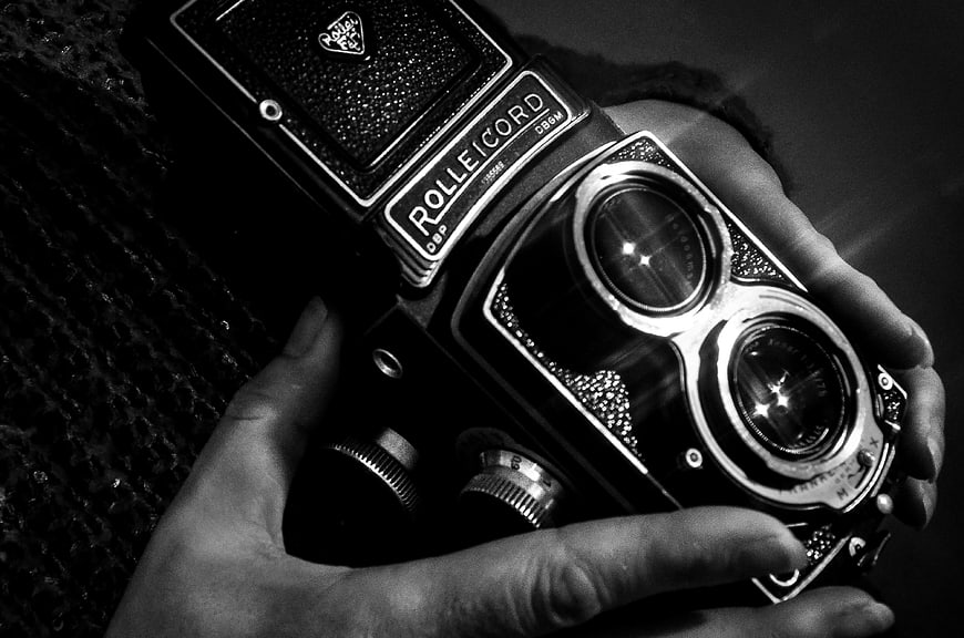 Vintage Rolleicord Camera Held in Hands