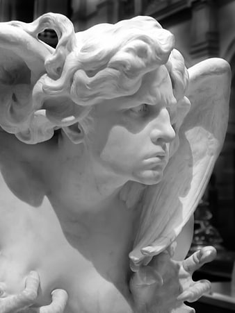 Close-up of Marble Angel Statue with Wings