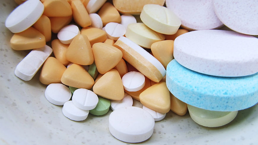 Assorted Colorful Medicine Pills and Tablets Close Up