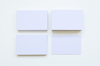 Blank white business card mockup on clean background