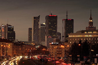 Warsaw City Skyline at Dusk with Traffic Light Trails