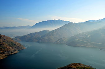 Misty Mountain Lake Landscape with Winding Road