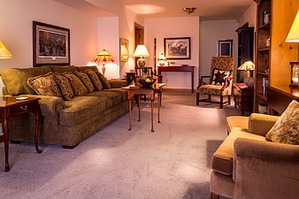 Traditional Living Room Interior With Brown Sofa And Stained Glass Lamps