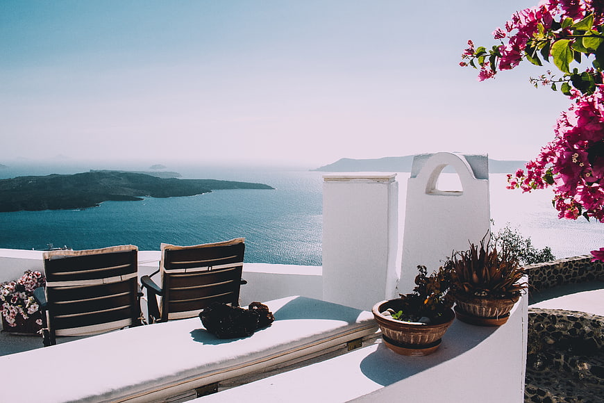 Santorini balcony view with bougainvillea and sea