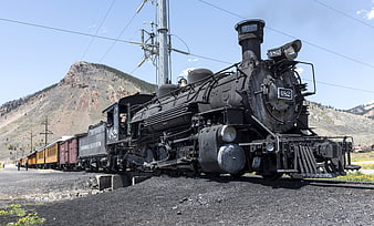 Historic Steam Locomotive 482 on Railroad Tracks in San Juan Mountains