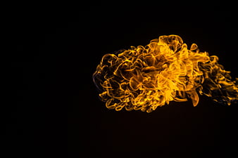 Abstract yellow flame burst isolated on black background
