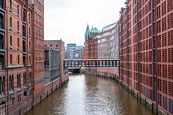 Hamburg Speicherstadt Canal with Red Brick Warehouses and Bridge