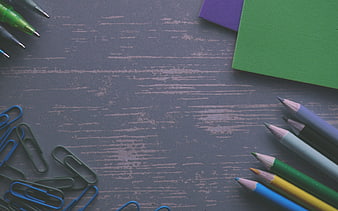 Colorful Stationery on Textured Grey Desk Background