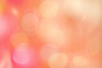 Warm Pink and Orange Bokeh Background