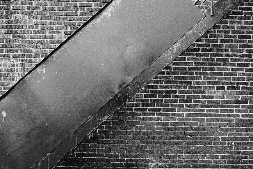 Black and White Urban Staircase on Brick Wall