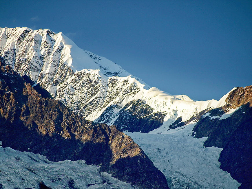 Majestic Snow-Capped Mountain Peak with Glacier