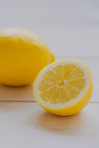 Fresh Cut Lemon on Wooden Surface