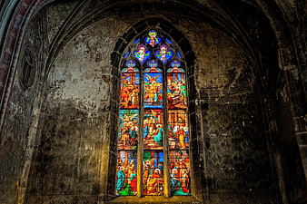 Gothic Stained Glass Window in Historic Cathedral Interior
