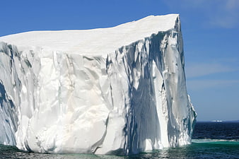 Massive Tabular Iceberg Floating in Arctic Ocean