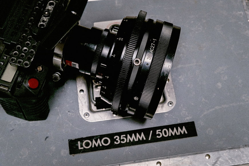 Close-up of vintage Lomo camera lens on metal surface