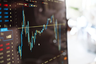 Close-up of Stock Market Candlestick Chart on Monitor