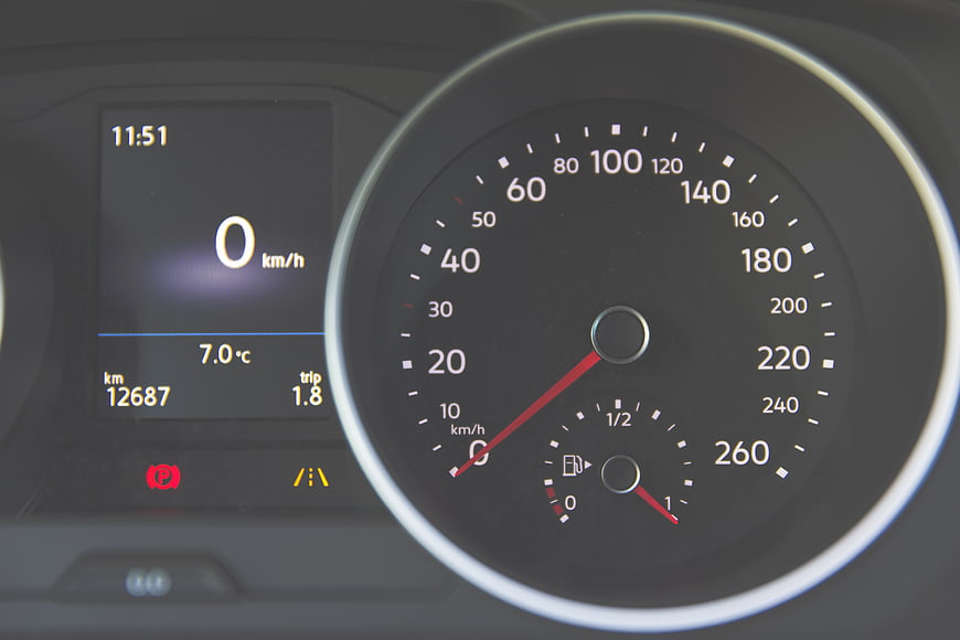 Car Dashboard Speedometer and Digital Display Close-Up