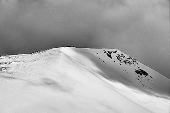 Dramatic Black and White Snowy Mountain Ridge Landscape