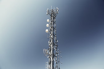 Telecommunications Tower Against Blue Sky