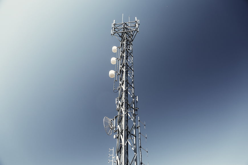 Telecommunications Tower Against Blue Sky