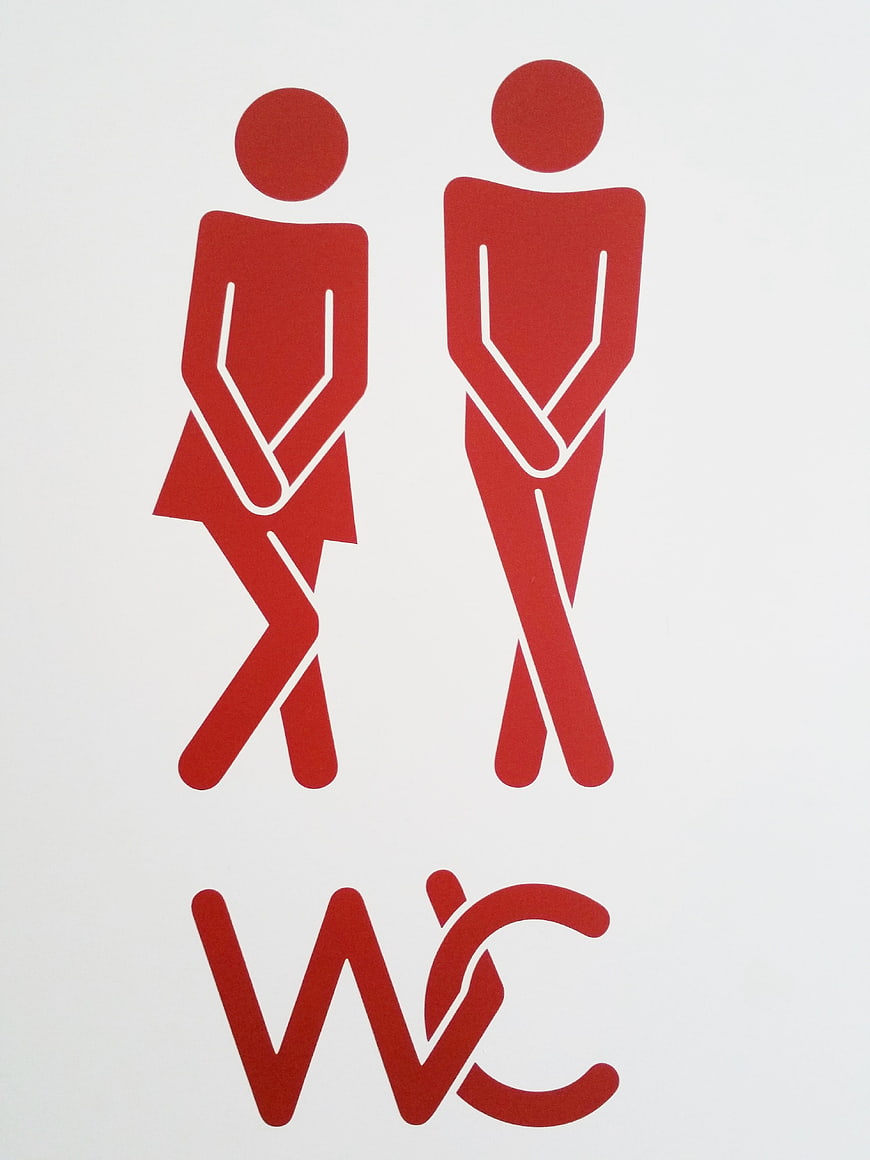 Red WC Toilet Sign with Man and Woman Icons