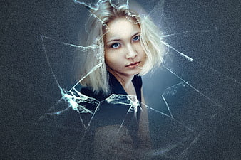 Portrait of Blonde Woman Behind Broken Glass
