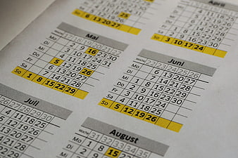 Close-up of German annual calendar with highlighted dates