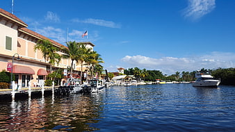Coastal Marina View With Boats And Mediterranean Architecture