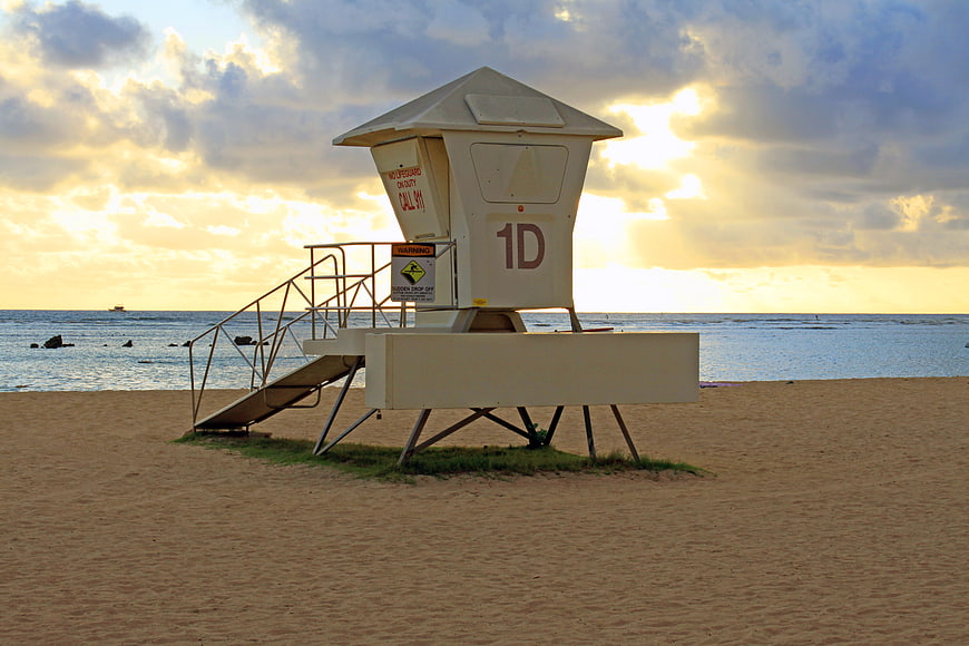 Lifeguard Tower on Sandy Beach at Sunset