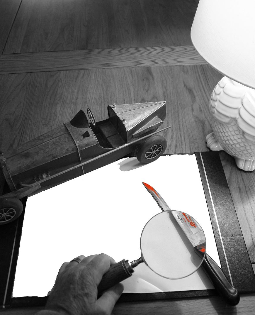 Detective Investigation Scene with Magnifying Glass and Knife