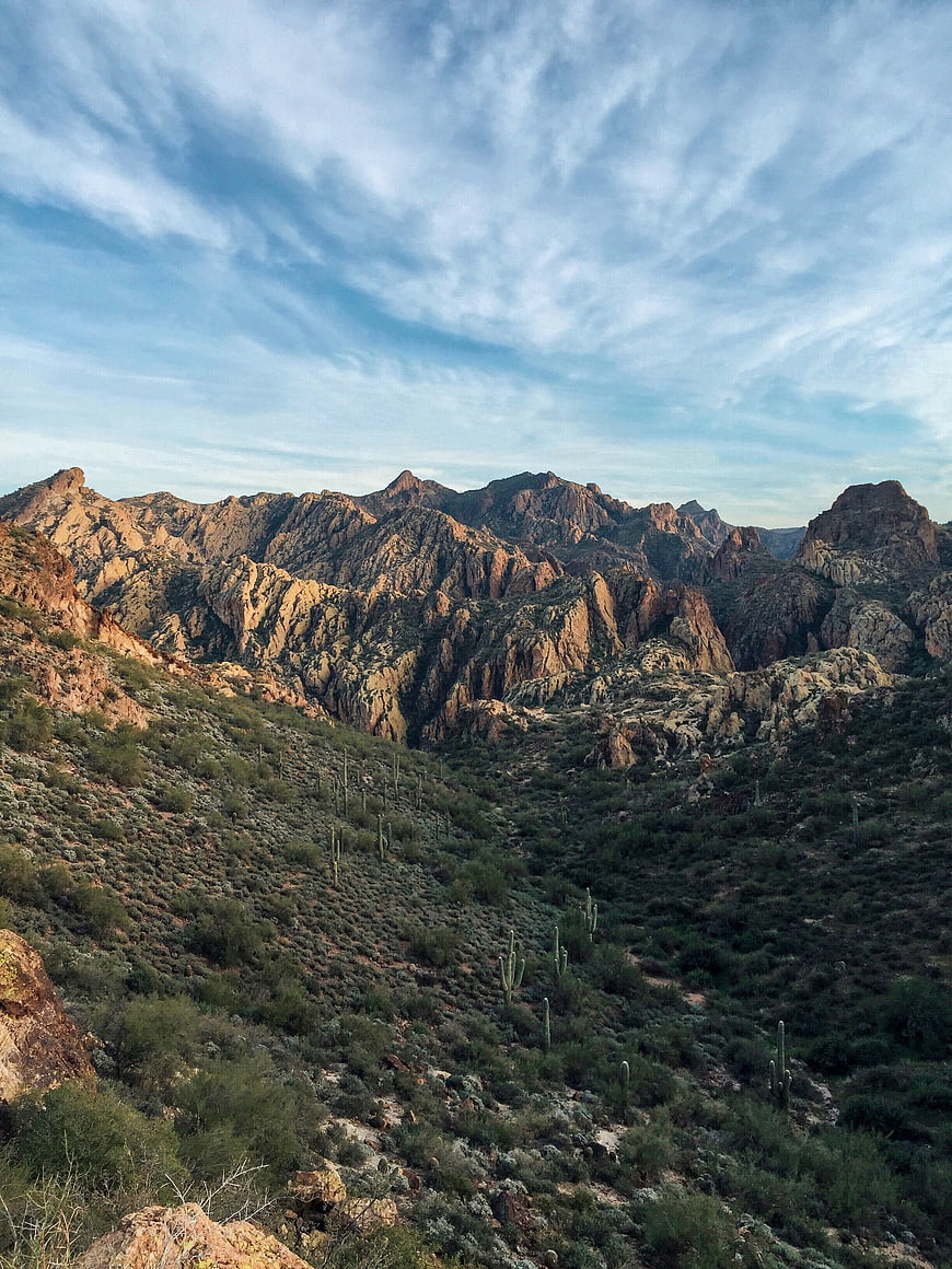 Scenic Desert Mountain Landscape with Cacti and Clouds